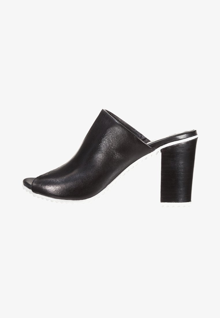 Steven New York Mules à talons - black
