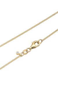 Collana in catena placcata oro con un design testurizzato, dotata di chiusura a moschettone e di una piccola pietra trasparente incastonata vicino alla chiusura.