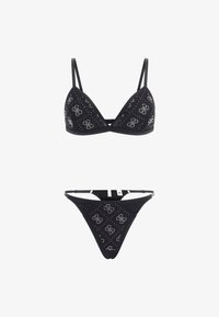 Conjunto de bikini negro que presenta un bralette triangular y un tanga, adornado con patrones de flores plateadas y tachuelas. Incluye tirantes ajustables.