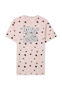 T-shirt rosa a maniche corte con grafica "L'amore è nell'aria" in bianco e nero. Decorato con motivi a cuori neri e bianchi sparsi.