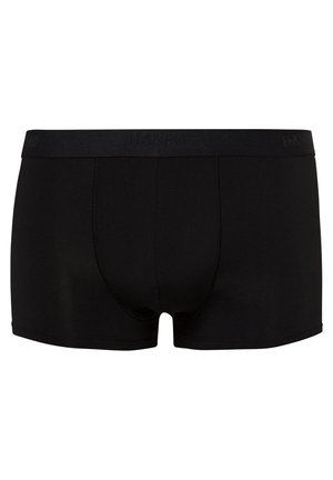 Zwarte boxershorts van een gladde stof, met een zachte elastische tailleband waarop de merknaam subtiel is geperst. Naadloos ontwerp en een nauwsluitende pasvorm.