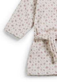 Blommönstrad morgonrock i mjuk gräddfärgad tyg, med små rosa blommor. Långa ärmar och ett knytbälte i midjan för stängning.