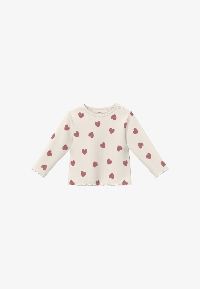 Chemise bébé crème à manches longues avec motif de cœurs roses, col rond, boutons pression sur l'épaule et bords festonnés.
