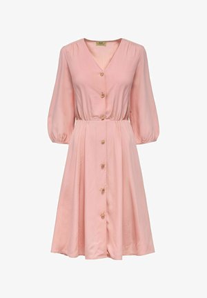 Jasnoróżowa sukienka z dekoltem w kształcie litery V, półrękawami i elastyczną talią. Posiada guziki z przodu i zwiewny dół. Gładka tekstura.