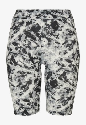 Cykelshorts i et monokromt abstrakt mønster, med et strækbart stof, mellemhøj talje og en glat overflade.