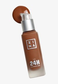 Brun glasflaska med en silverpump och kork; märkt "3INA THE 24H FOUNDATION." Slät, ogenomskinlig yta med en gradvis övergång till klart.