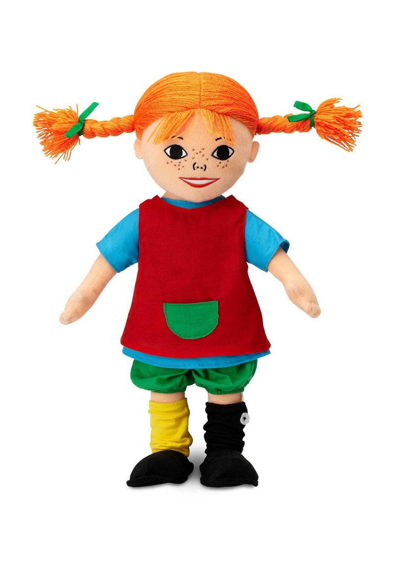 Doll with orange braided hair, blue shirt, red dress with green pocket, green shorts, mismatched yellow and black socks, and black shoes.