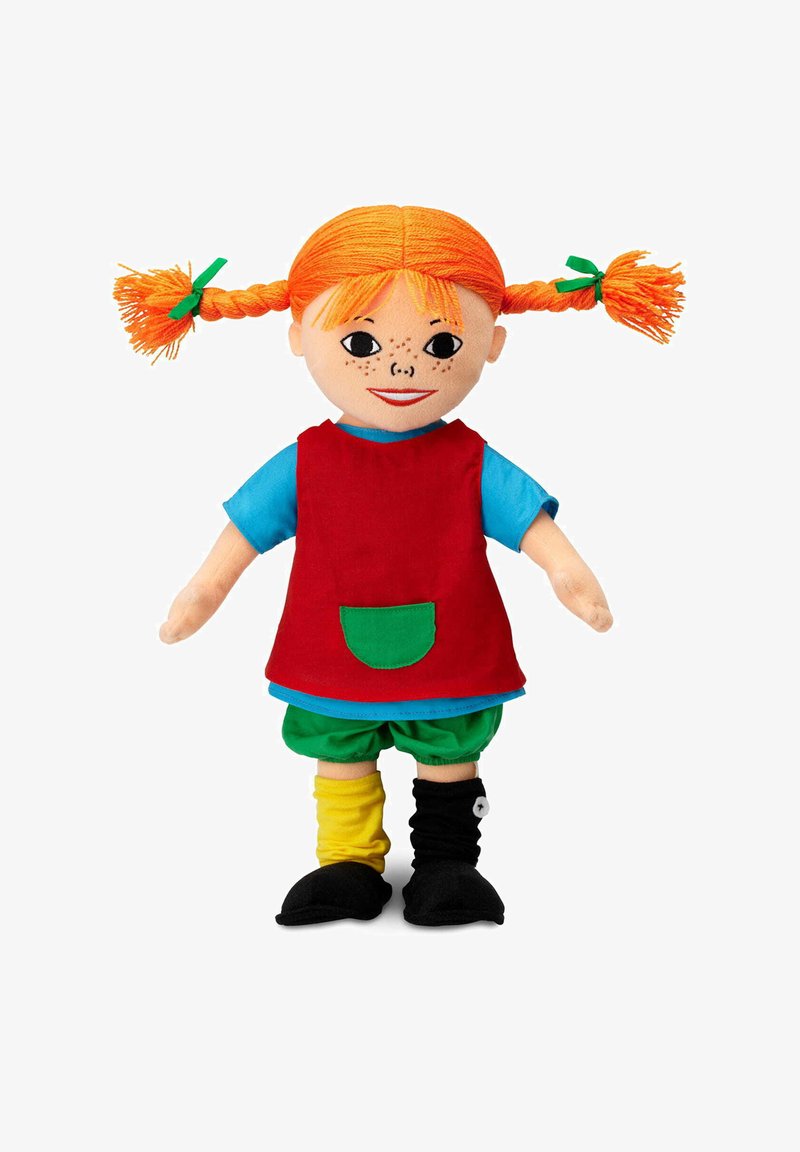 Doll with orange braided hair, blue shirt, red dress with green pocket, green shorts, mismatched yellow and black socks, and black shoes.