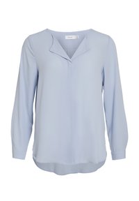 Blouse bleu clair en tissu doux avec un design sans col, manches longues, et un ourlet légèrement arrondi. Présente une couture centrale à l'avant.