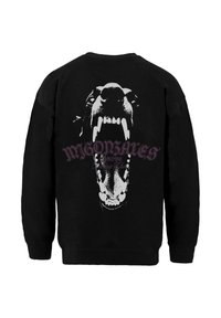 Czarna bluza z dużym nadrukiem przedstawiającym otwartą, warczącą paszczę psa z ostrymi zębami oraz napisem "MIGONSALES" na całej szerokości.