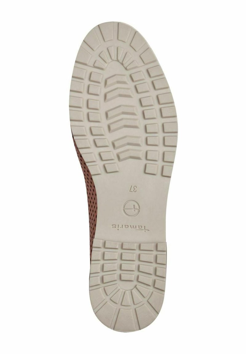 Suola delle scarpe con un design in gomma testurizzata; base bianca con un bordo superiore marrone a motivo che presenta numerosi fori di ventilazione.