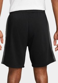 Nike Sportswear Pantaloni sportivi - schwarz