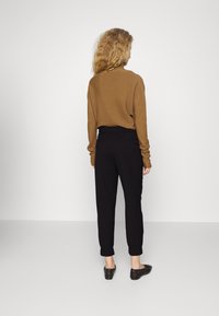 DRYKORN Kalhoty - black