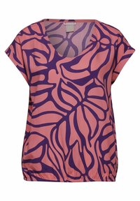 Short-sleeve top in pink fabric featuring a bold purple leaf pattern, a V-neck design, and a gathered elastic hemline for shape.
