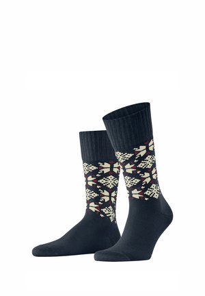 Marineblaue Socken mit einem gemusterten Design in Creme, Rot und Dunkelblau, ausgestattet mit einem gerippten Bund und einer glatten Textur.