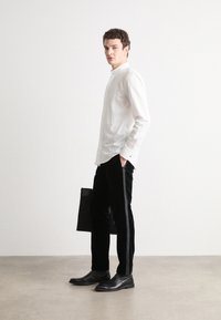 HUGO GETLIN - Suit trousers - black