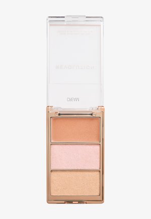 Compacte make-up palette met drie crèmekleuren in brons, roze en goud, geplaatst in een rechthoekig doosje met een transparante deksel.
