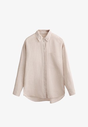 Lysbeige langærmet skjorte i struktureret stof. Knaplukning foran med en enkelt brystlomme. Rundet nederkant og klassisk kravedesign.
