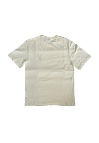 Short-sleeve, crew-neck t-shirt in off-white cotton, featuring a smooth texture and a small black label at the hem.