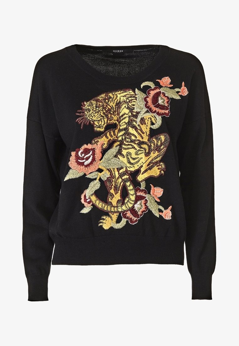 Czarny sweter z teksturowanym dekoltem w serek oraz misternymi haftowanymi wzorami tygrysa i kwiatów w kolorach żółtym, czerwonym i zielonym.