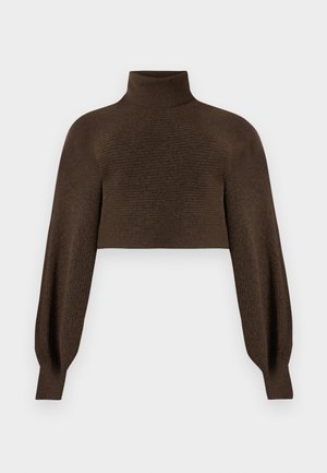 Ruskotettu cropped-takki, jossa on ribbitetty pinta ja tilavat hihat, valmistettu pehmeästä ja lämpimästä materiaalista.