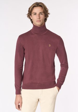 Maglione a collo alto color bordeaux realizzato in tessuto morbido, con orlo e polsini a costine, e un piccolo logo ricamato sul petto.