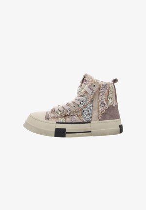High-top sneakers with a beige, textured fabric upper. Features silver and gold glitter accents, a thick cream rubber sole, and beige laces.