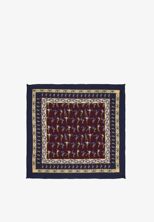 Jedwabny kwadratowy szal z marsjańskim wzorem w centrum przedstawiającym figury w niebieskim i beżowym, z granatowym brzegiem i żółtymi akcentami ozdobnymi.