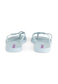 Light blue flip-flops with textured footbed, thin straps, and a purple accent near the heel. Simple design suitable for casual wear.