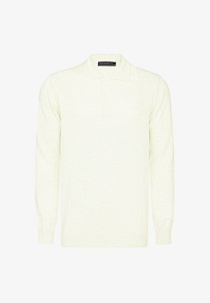 Long-sleeve polo in light cream color, made of soft textured fabric, featuring a collared neckline, three-button placket, and ribbed cuffs.