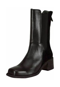 Stivaletto in pelle nera alla caviglia con pannelli laterali elasticizzati, punta leggermente arrotondata e tacco spesso. Finitura liscia con accenti in suede.