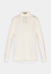 Langermet kremfarget polo-skjorte med spiss krage, tre-knaps placket, grønne detaljer i sømmen og brodert logo på skulderen.