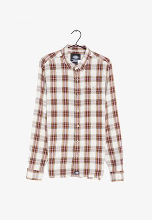 Camisa de cuadros de manga larga en blanco con rayas rojas, marrones y amarillas. Presenta cierre de botones y un bolsillo en el pecho. Está hecha de tela tejida.