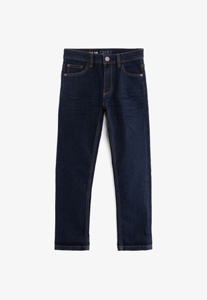 Tmavomodré džínsy so striha rovného nohu, päť vreciek, medené nitovanie a kontrastné oranžové šitie.