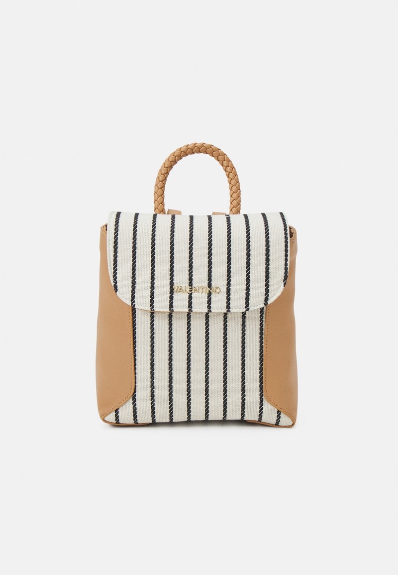 Striped fabric backpack in cream and navy, featuring tan leather sides and a braided handle. Gold logo detail on the front flap.