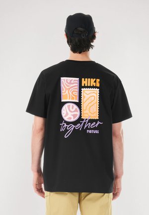 Black cotton t-shirt featuring colorful graphic designs on the back, including the text "HIKE together" and abstract shapes.