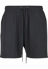 Schwarze Stoffshorts mit einem elastischen Bund, verstellbarem Kordelzug und Seitentaschen. Einfaches Design, glatte Textur, lockere Passform.