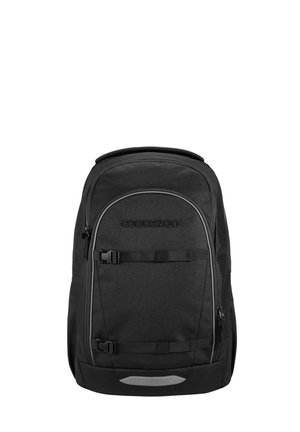 Black Coocazoo backpack with front zip pocket, adjustable straps, and reflective patch at the bottom.