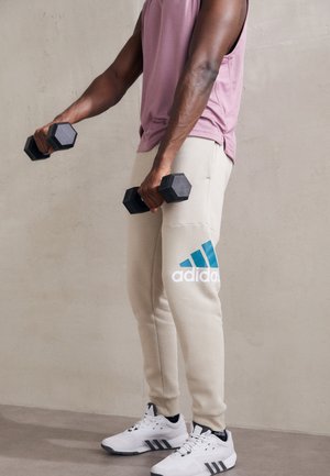 adidas Sportswear, Pantalon de survêtement - beige