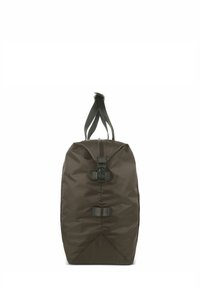 Borsa a duffel verde scuro realizzata in nylon testurizzato, dotata di due manici superiori e due chiusure a fibbia. Base affusolata per una maggiore stabilità.
