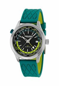 Nerūdijančio plieno GMT laikrodis su juodu ciferblatu, geltonais ir baltais žymenimis, sukamu bezeliu ir žaliu tekstūruotu guminiu dirželiu su šviesiai žaliu apmušalu.