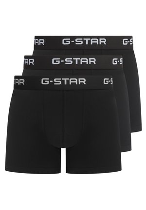 Schwarze Boxer-Shorts mit elastischem G-STAR-Bund und weißem Logo, Dreierpack, glatte Textur und figurbetontes Design.