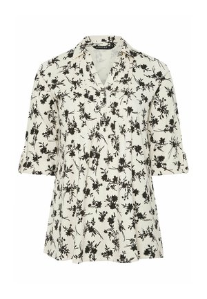 Hvid bluse med sort blomsterprint, korte ærmer med opklebede stropper, V-hals krave og løs pasform.