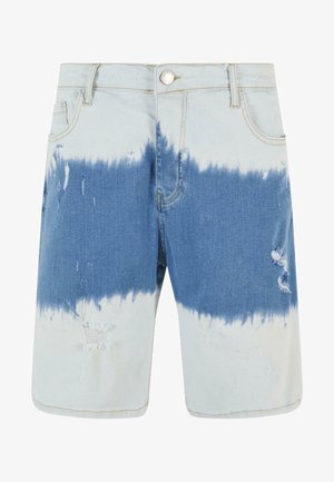 Shorts en denim avec un design en dégradé allant du bleu clair au bleu foncé, des zones usées et un ourlet brut. Matériau : coton.