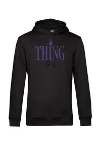 Felpa nera con cappuccio, caratterizzata da una grafica viola con la scritta "THING" e un'impronta di mano. Ha un cappuccio con coulisse e una tasca frontale.