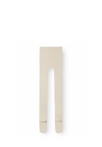 Collant color beige chiaro realizzati in un tessuto liscio ed elastico con una trama a coste, dotati di un elastico in vita e punta chiusa.