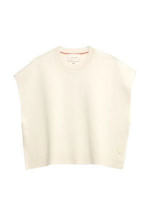 Pull sans manches en maille couleur crème avec un col rond et un petit logo triangulaire près de l'ourlet côté droit.