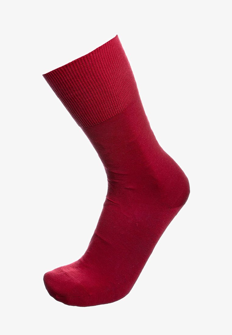 Red cotton sock with a ribbed top, smooth texture, and seamless toe design. Suitable for casual wear and comfortable fit.
