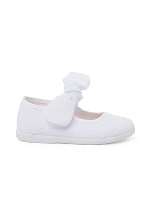 Witte stoffen ballerina's met een gestructureerd stippenpatroon, een ronde neus en een strikaccent aan de zijkant. Zacht, flexibel zool voor comfort.