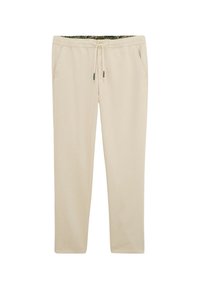 Pantalon de survêtement beige avec taille élastique à cordon de serrage, deux poches latérales et doublure intérieure à motif camouflage. Tissu doux, jambes ajustées.